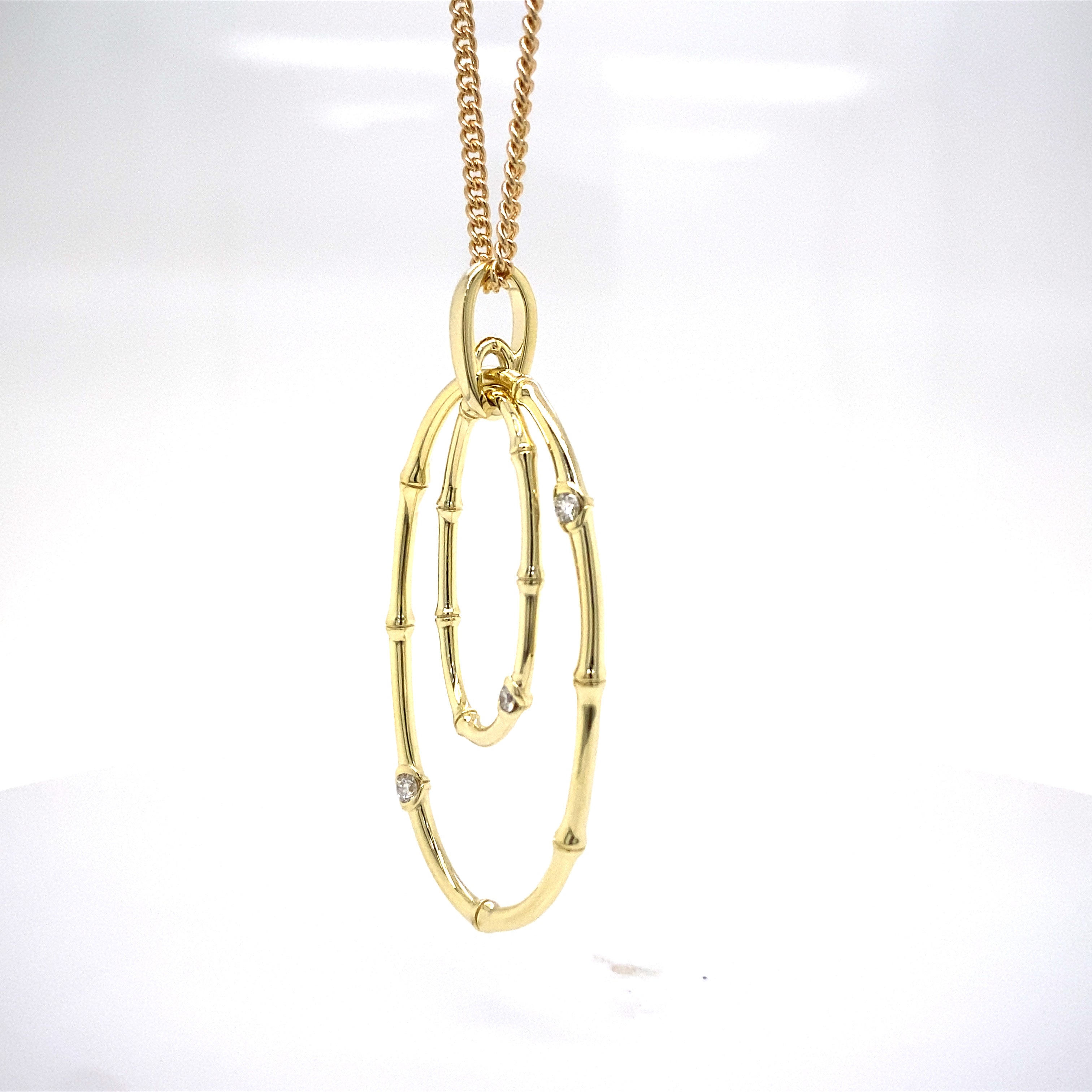 9ct yellow gold diamond pendant.