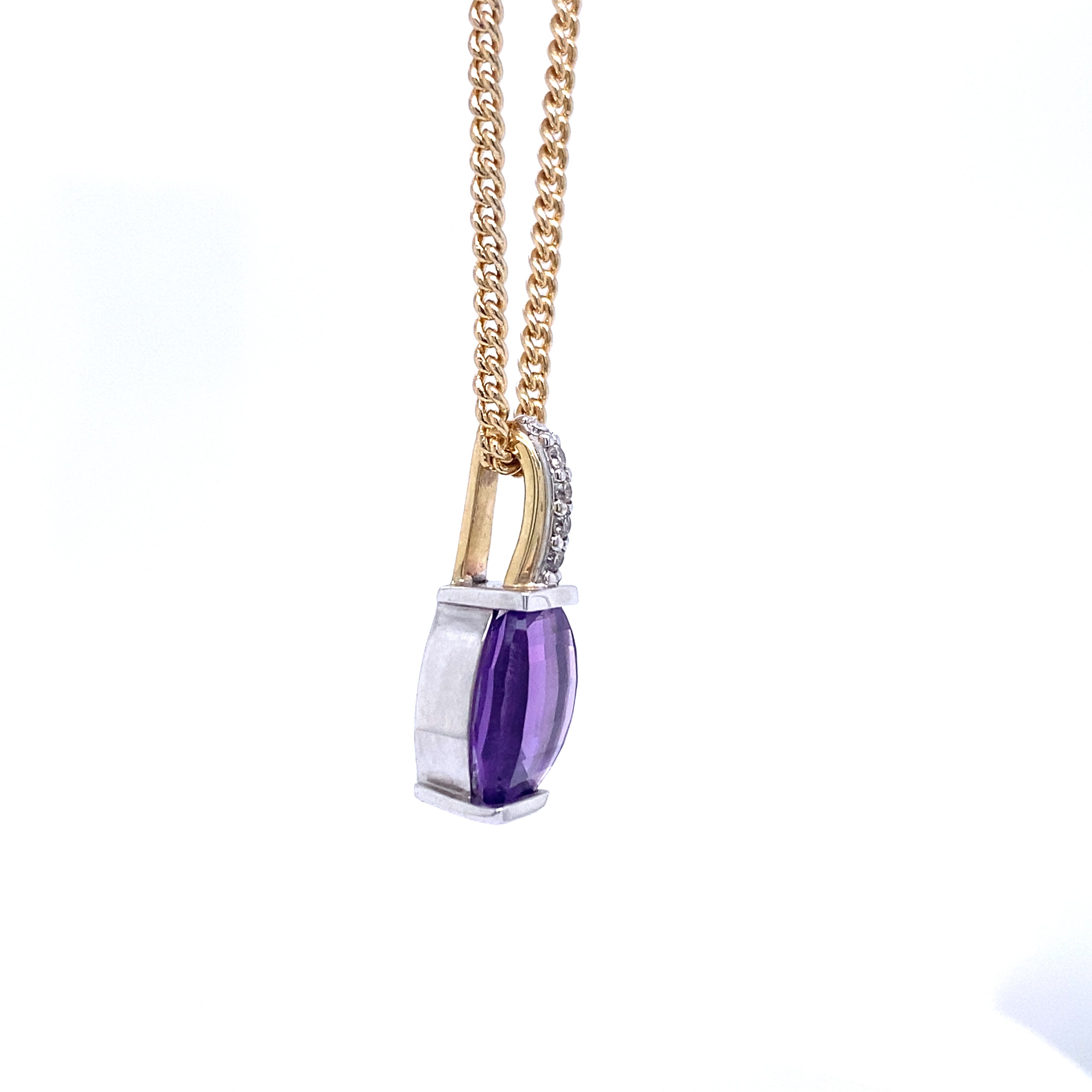 9ct yellow gold amethyst and diamond pendant.