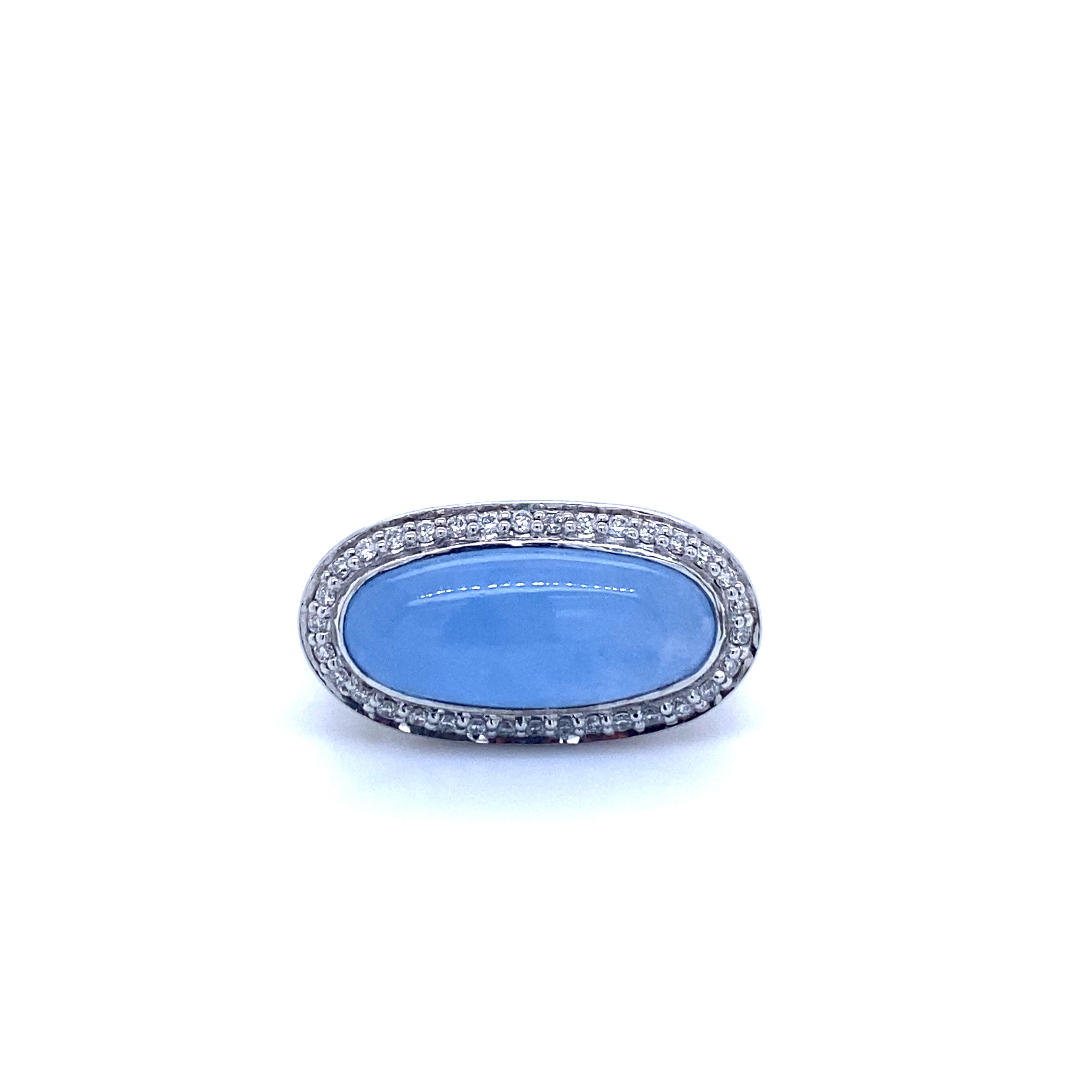 9ct white gold blue jade and diamond ring.