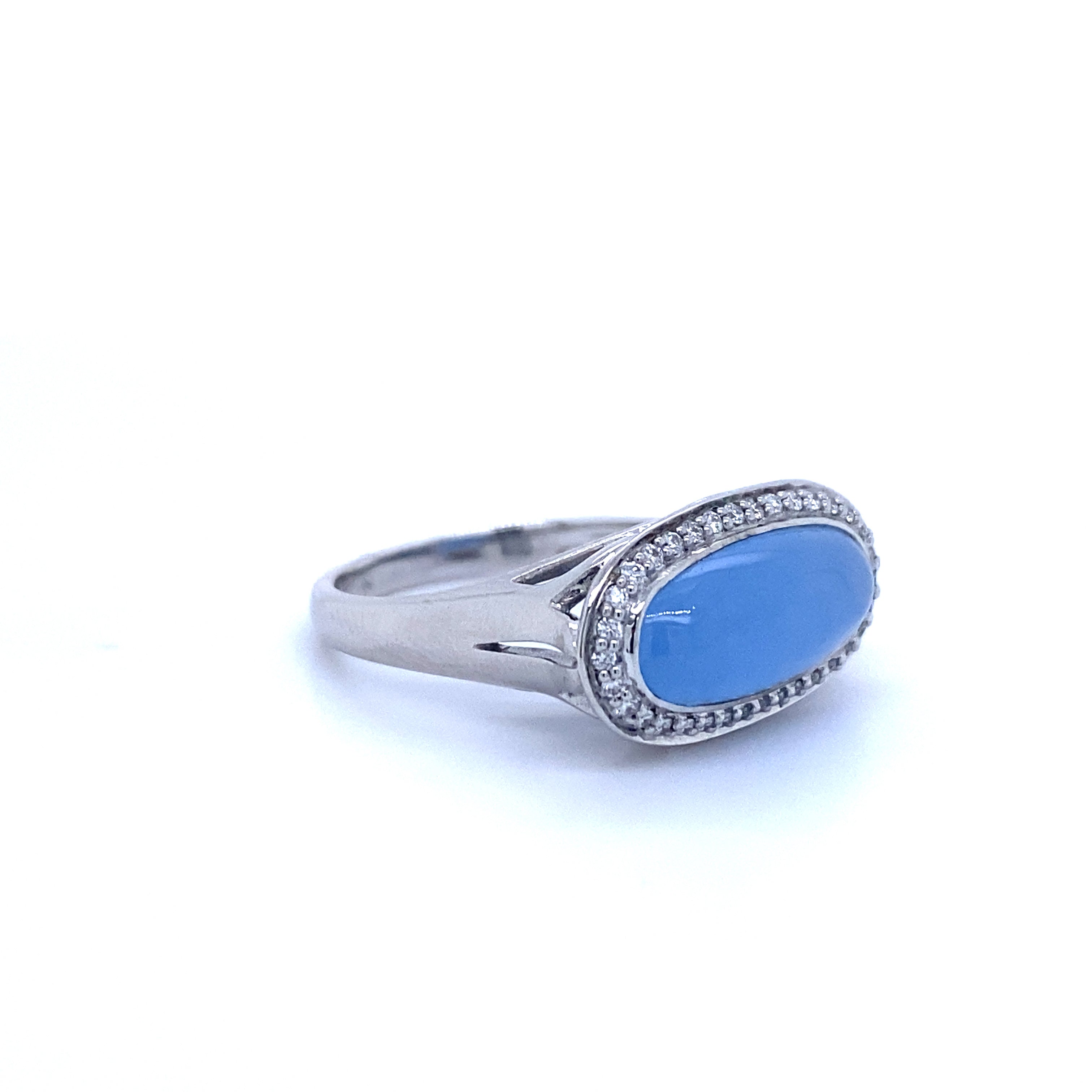 9ct white gold blue jade and diamond ring.