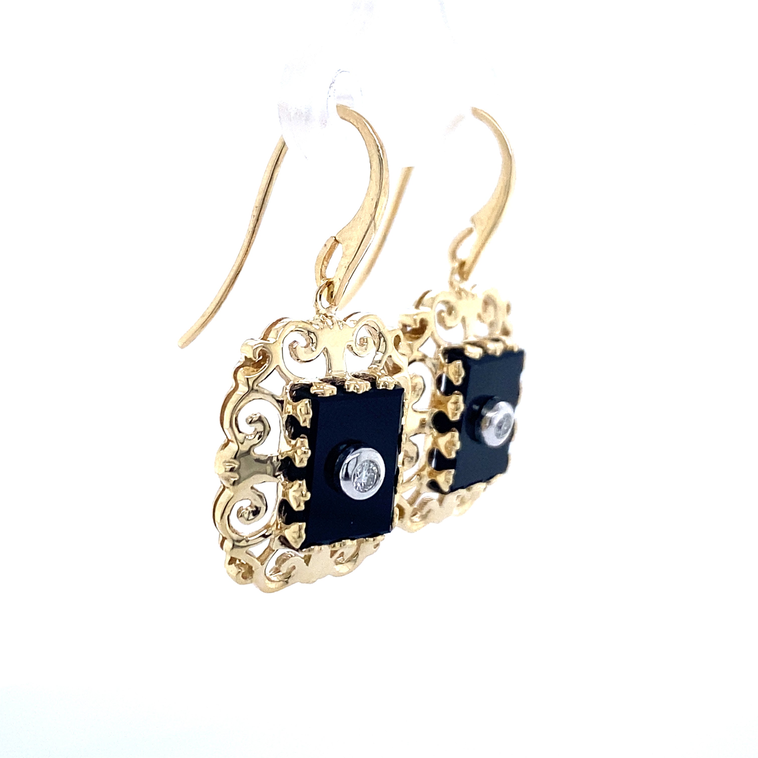 9ct yellow gold onyx and diamond earrings.
