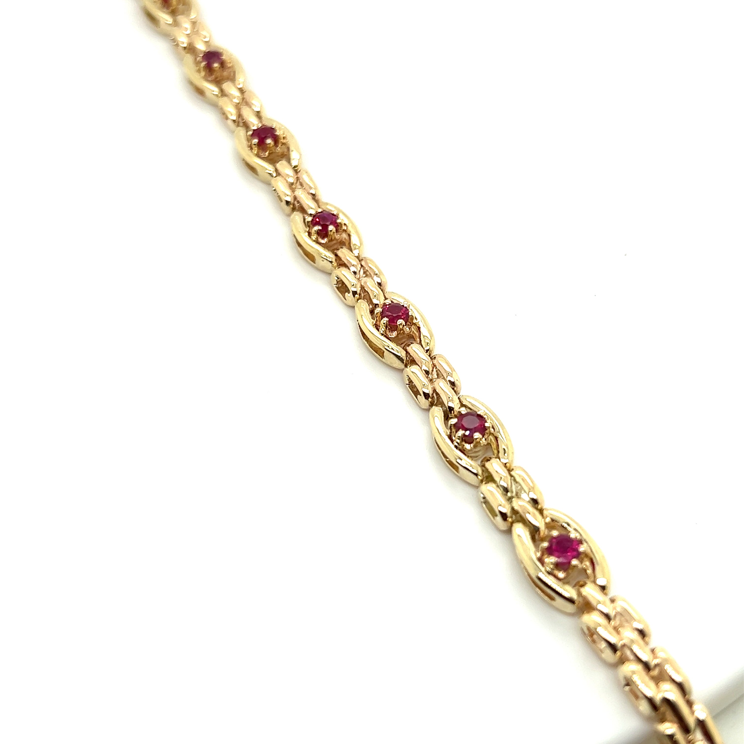 9ct yellow gold Burmese ruby bracelet.
