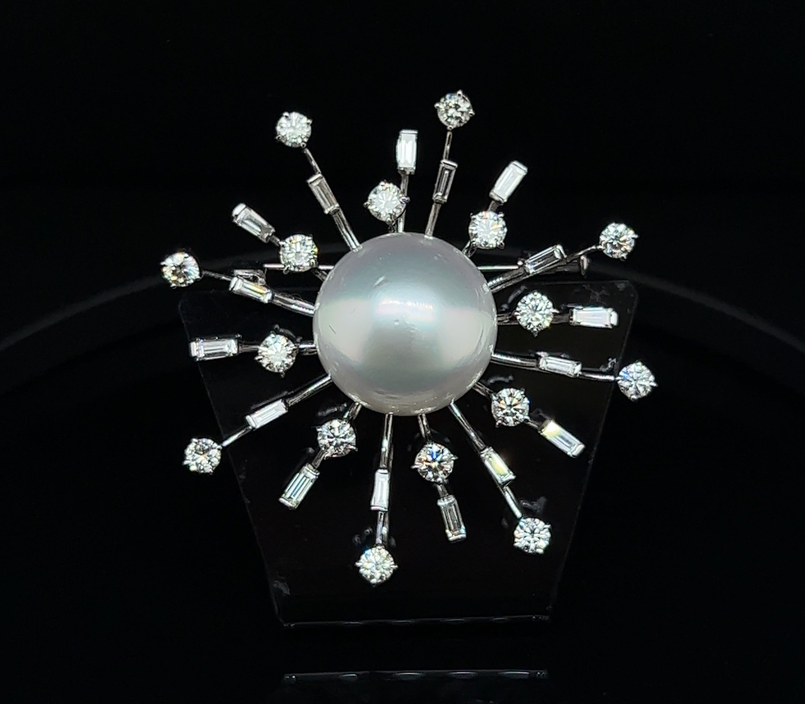 18ct white gold pearl and diamond brooch.