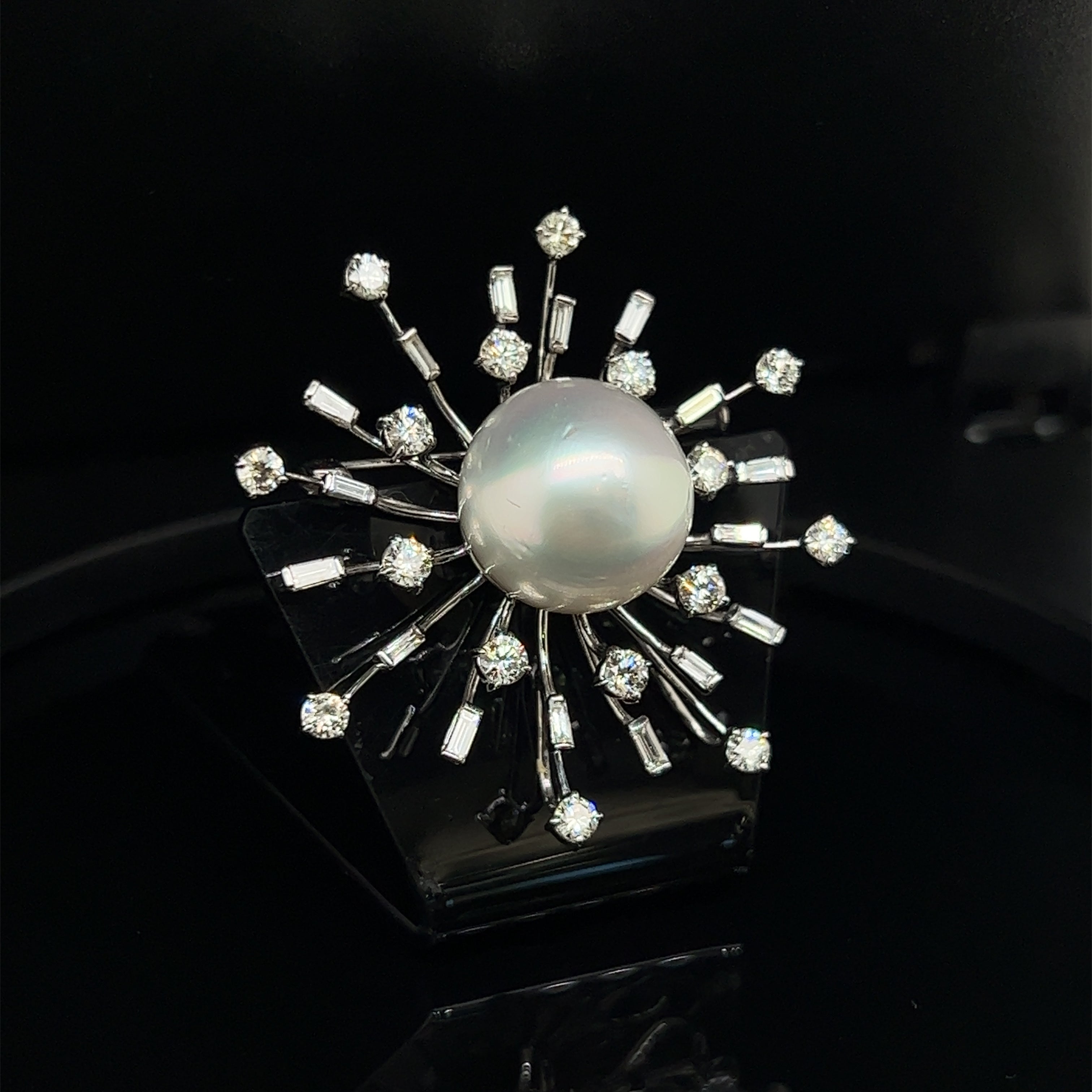 18ct white gold pearl and diamond brooch.