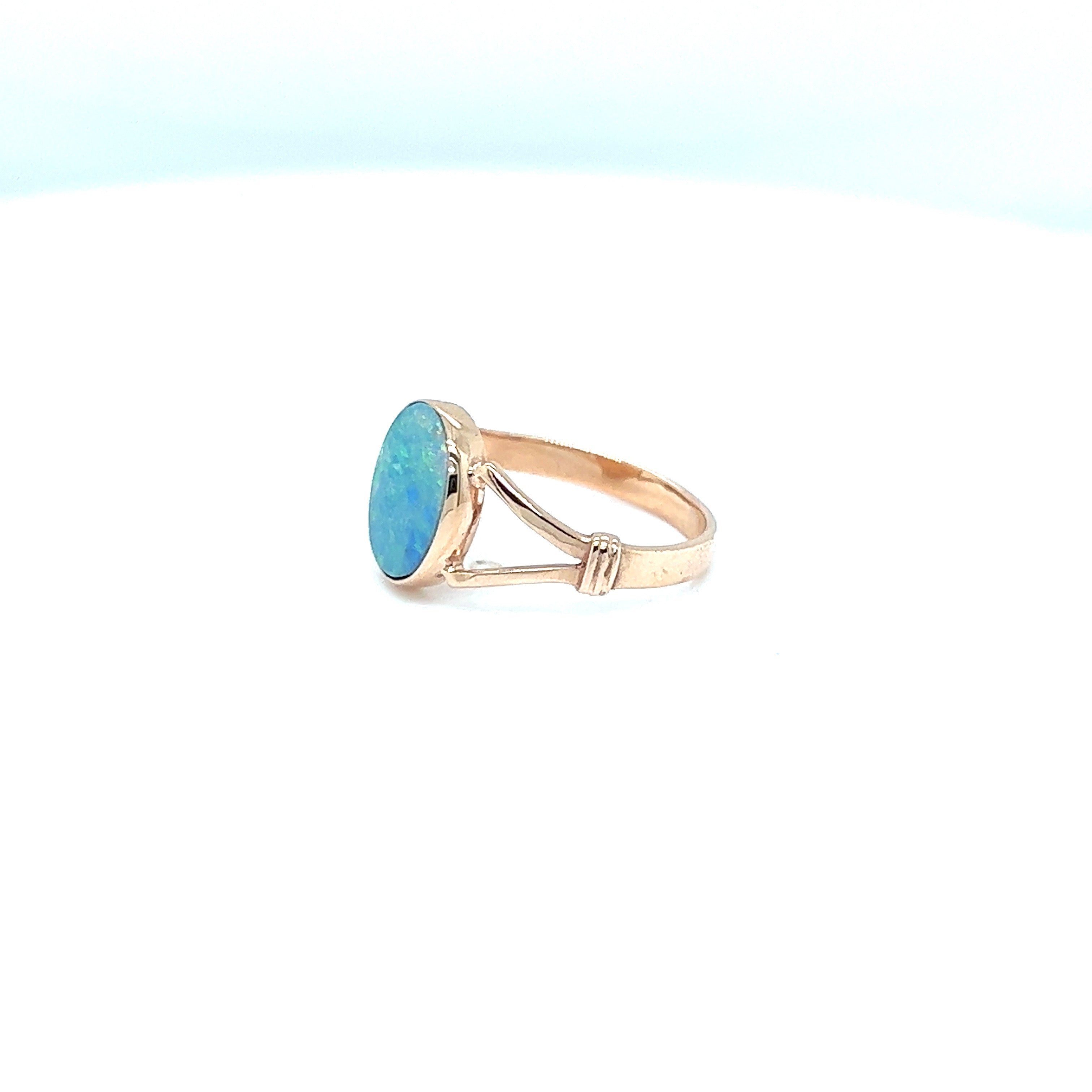 9ct rose gold doublet opal ring.