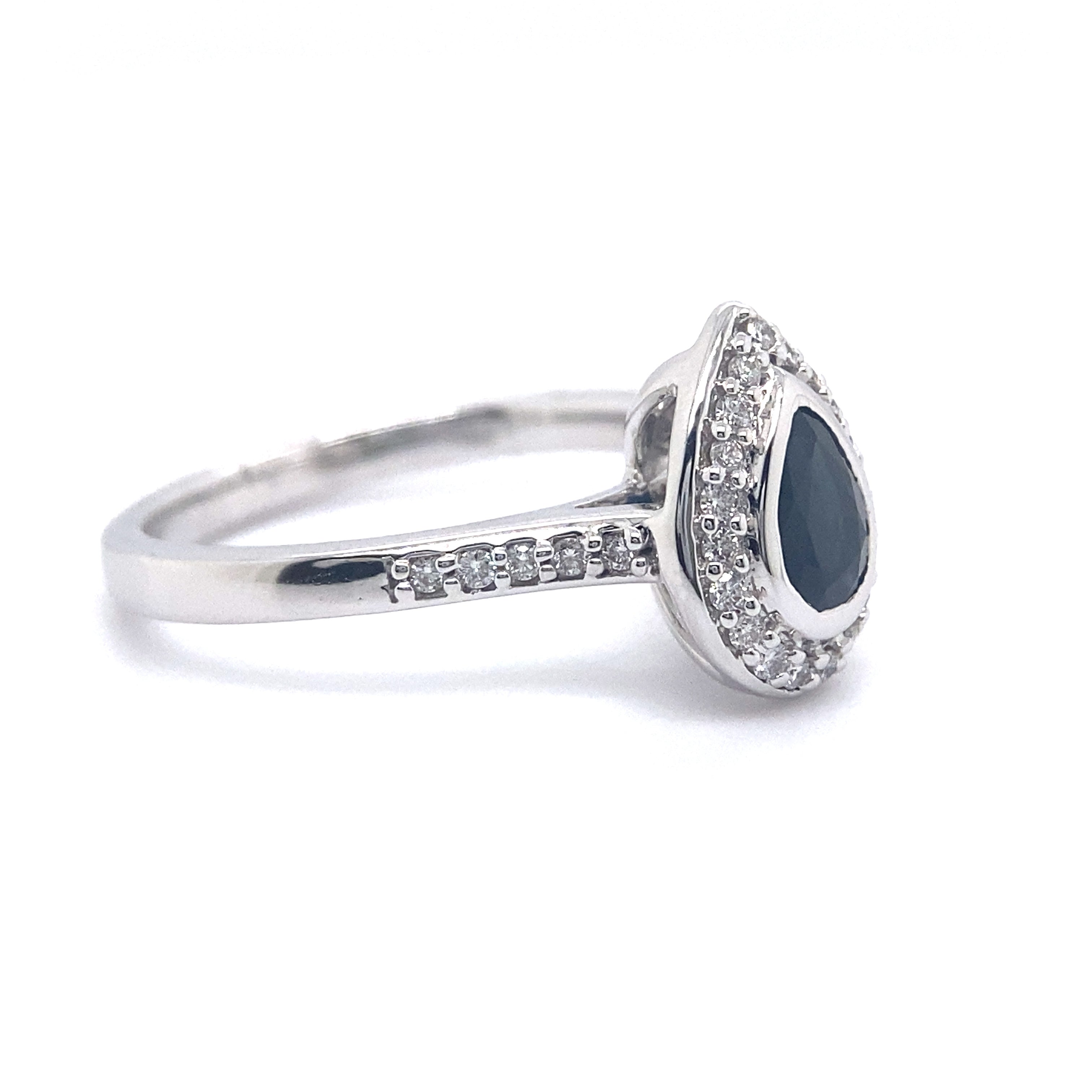 18ct white gold natural sapphire and diamond ring.