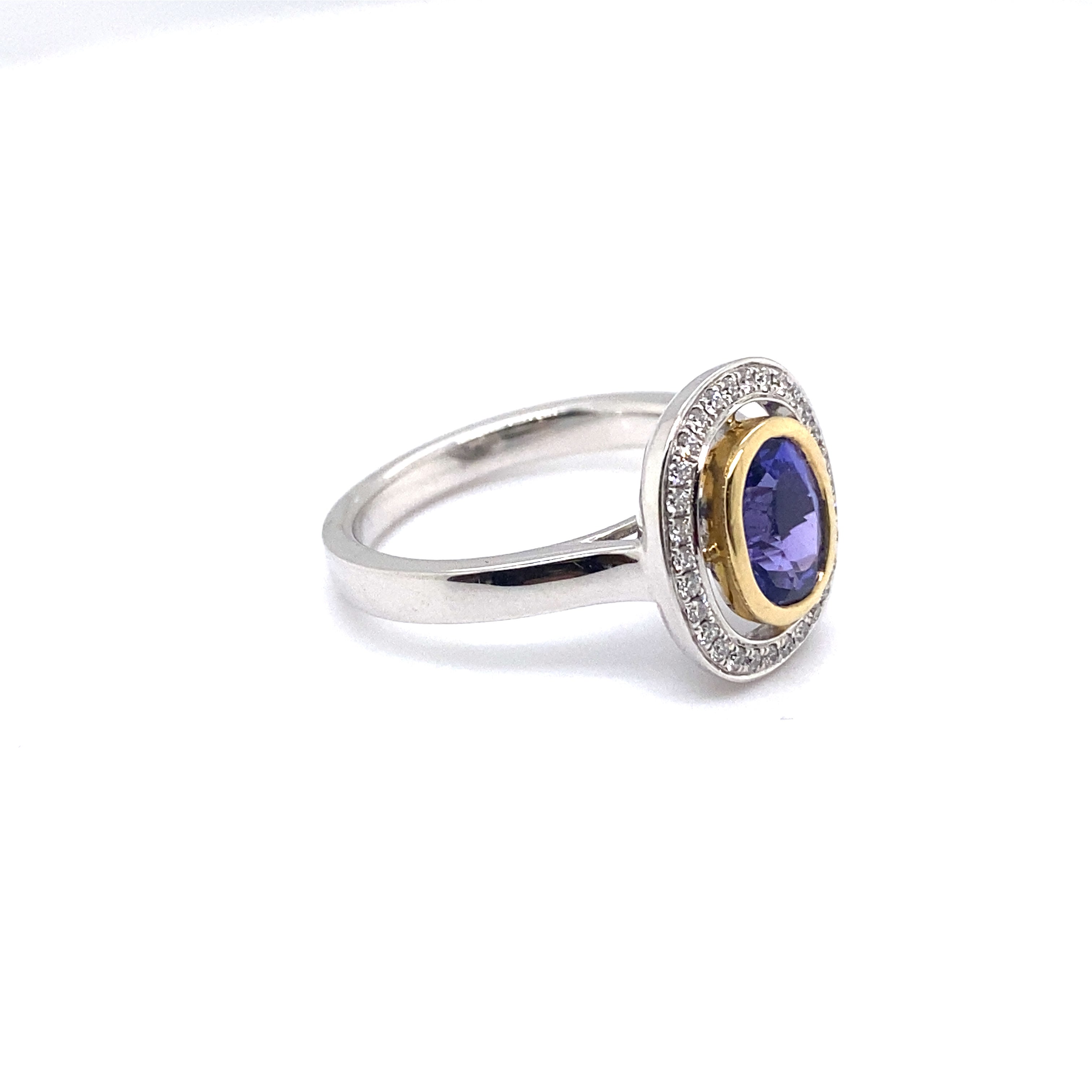 9ct white gold tanzanite and diamond ring.