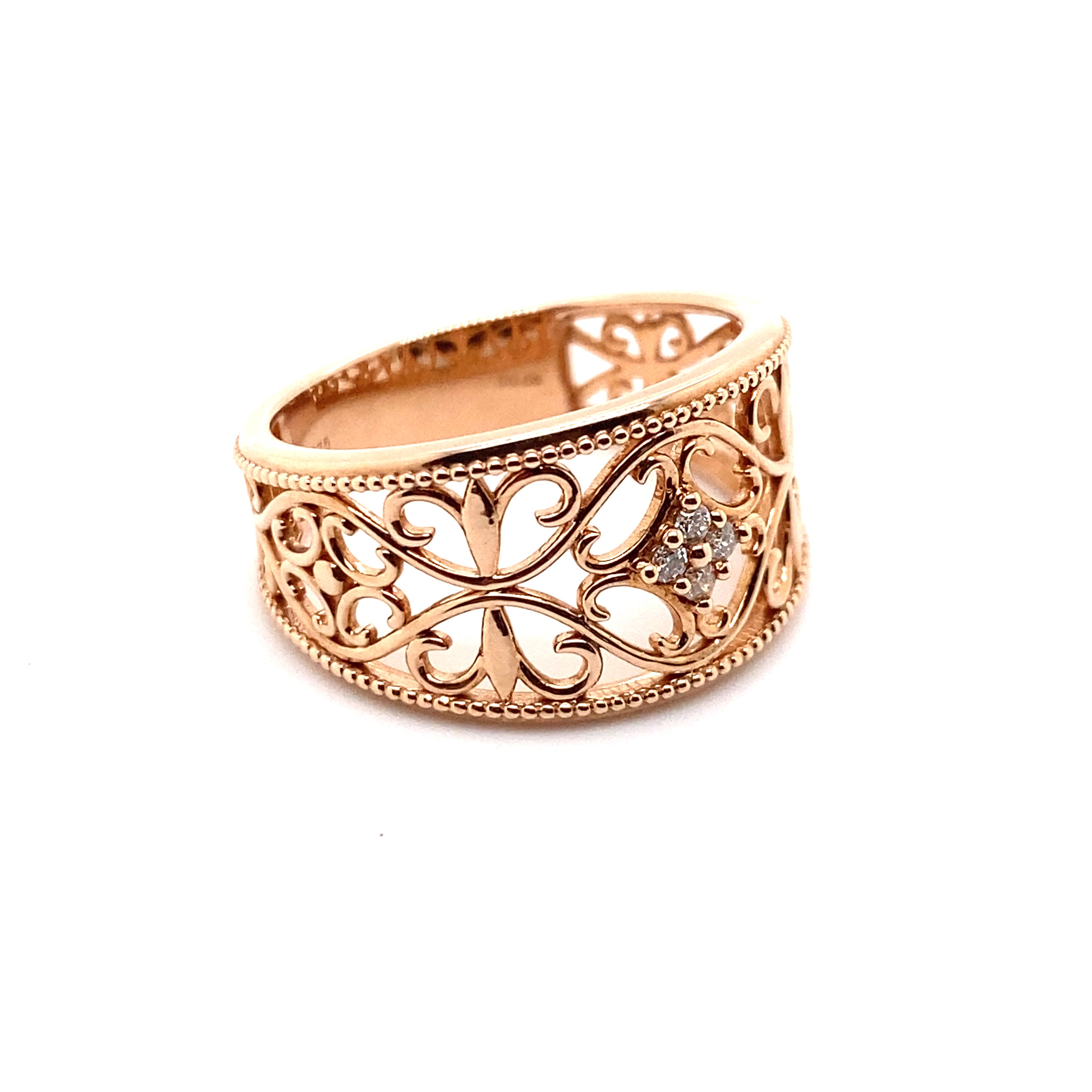9ct rose gold filagree. diamond dress ring.