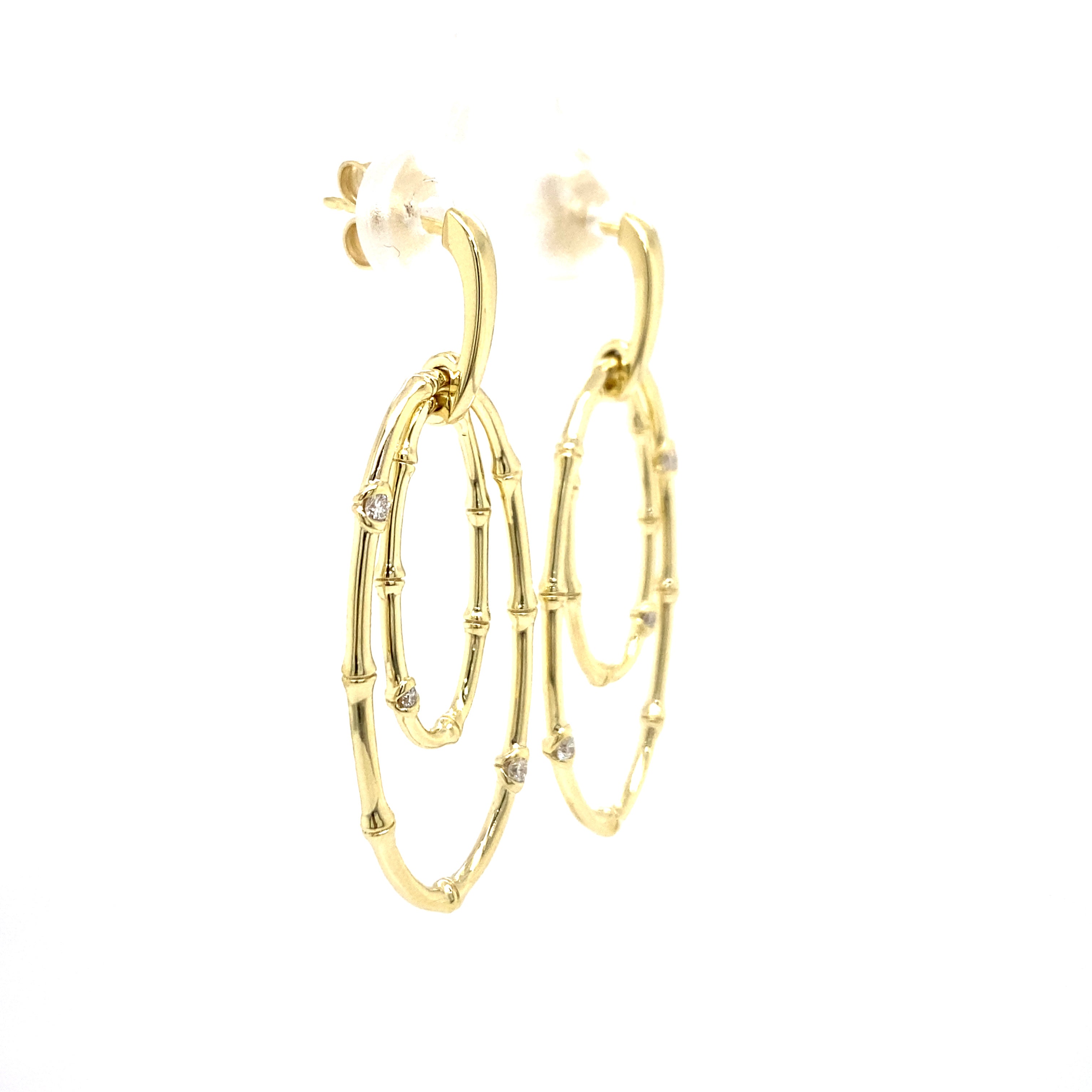 9ct yellow gold diamond oval earrings.