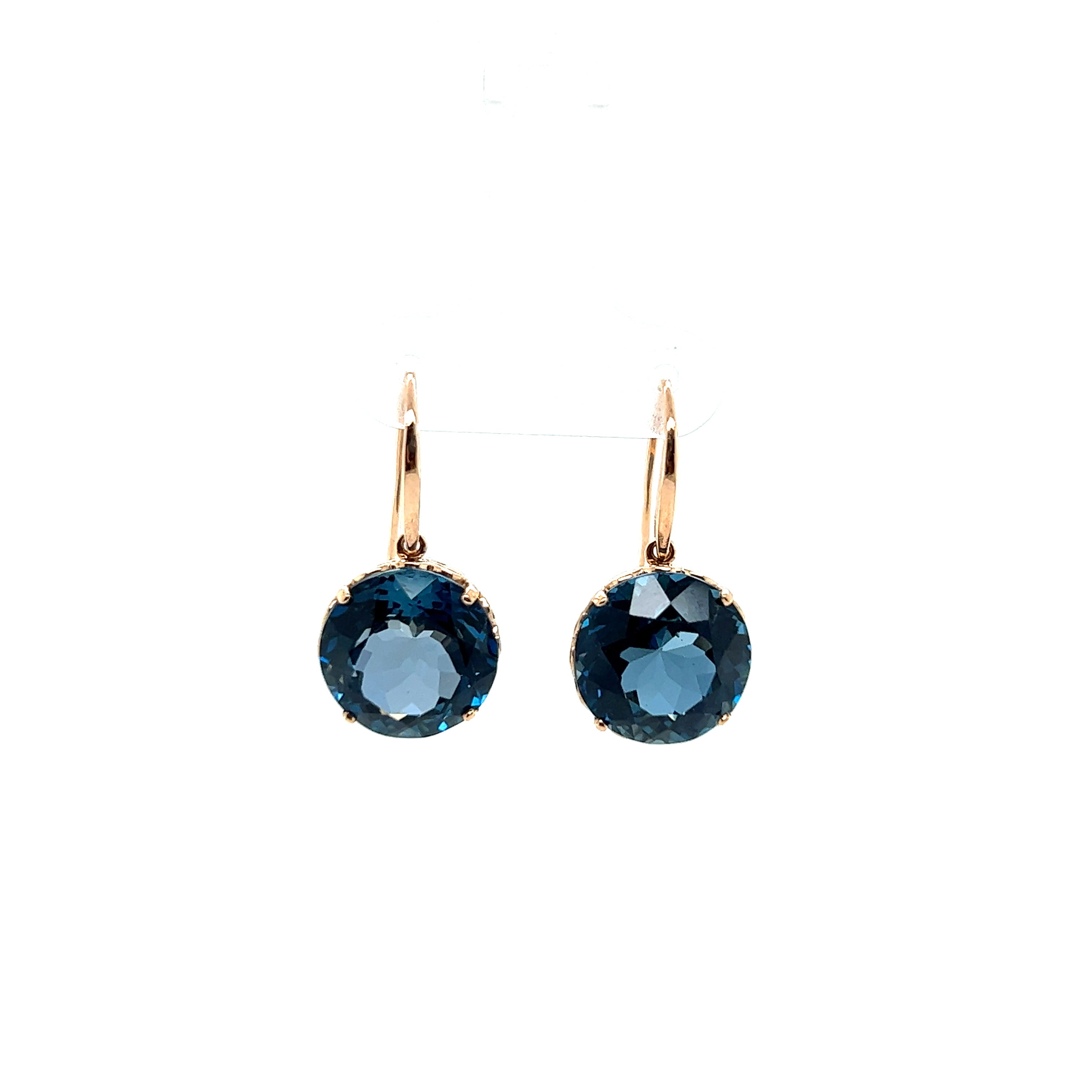9ct rose gold London blue topaz earrings.