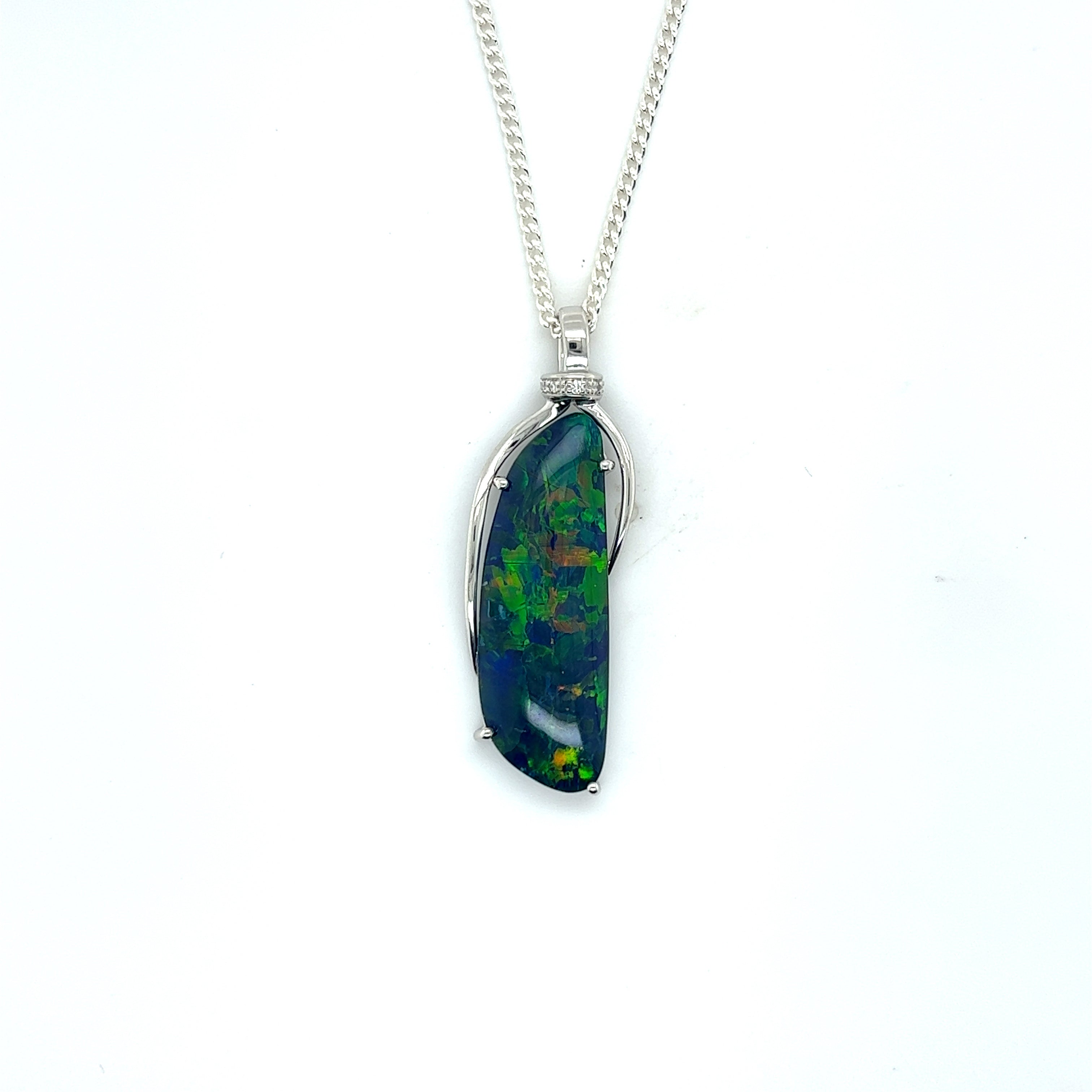 9ct white gold triplet opal with diamond bale.
