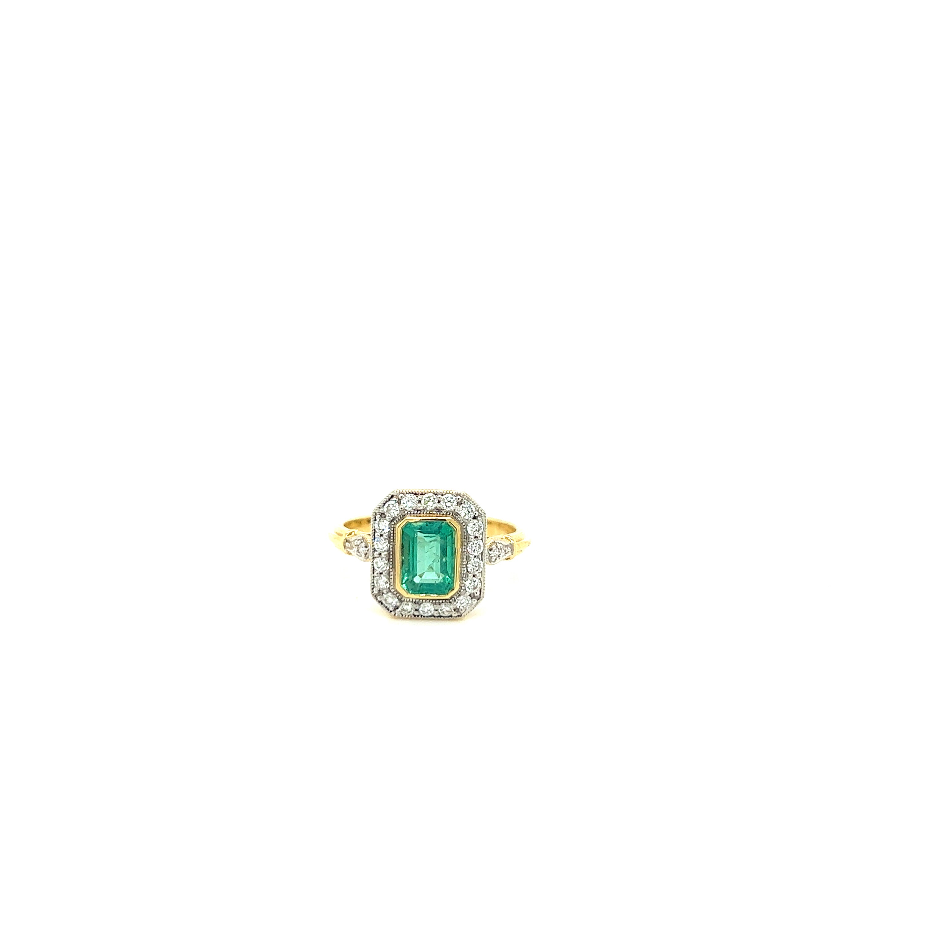 18ct yellow gold emerald and diamond ring.